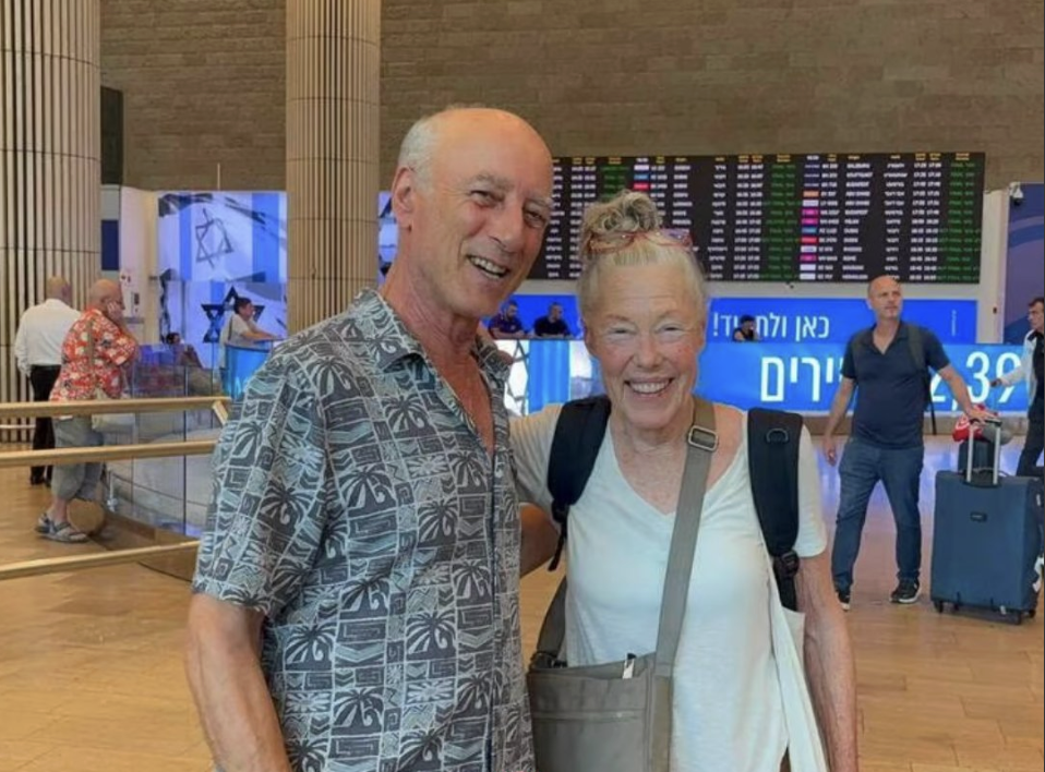 Adriana Turk, 74 reunites with relative Raanan Gidron, 73, both descended from Jews who survived the Holocaust.